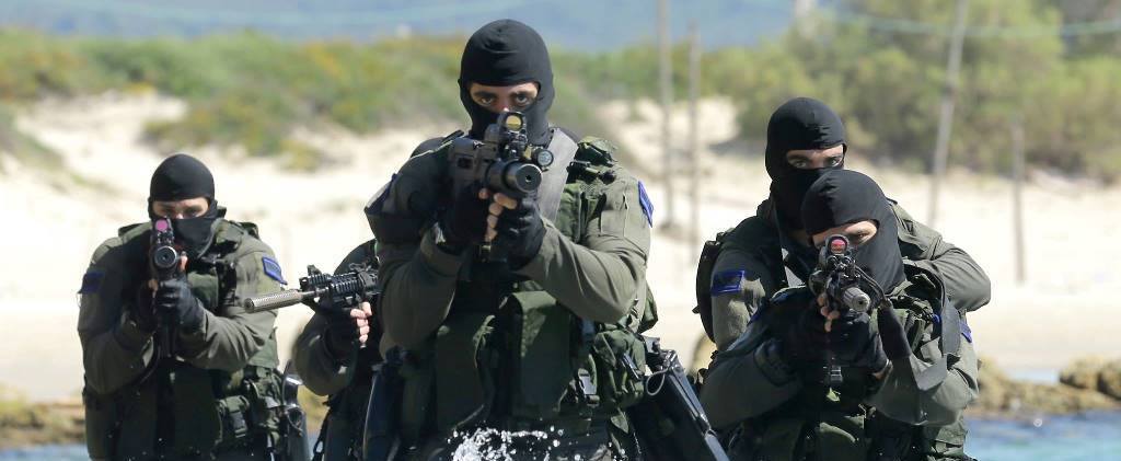 Shayetet 13 (Israeli Navy Seals) operators emerging from the sea