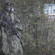 Solider wearing the M4 CBRN Military Poncho in the rain