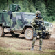 Military man with the NBC-77 SOF CBRN gas mask filter