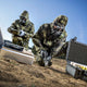 Two soldiers wearing the CM-7M Military Hazmat Mask