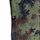 Close up of the grommets of M4 CBRN Military Poncho in the M-MDU-10 color scheme