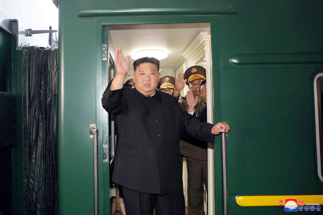 Kim Jong Un waving