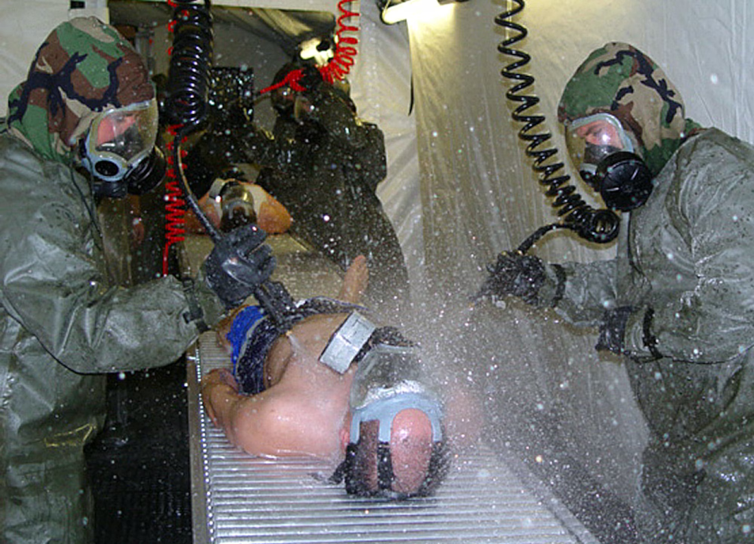 Airmen test medical decontamination shelter.