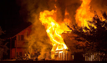 Raging Fire Consumes Building During Dark Night