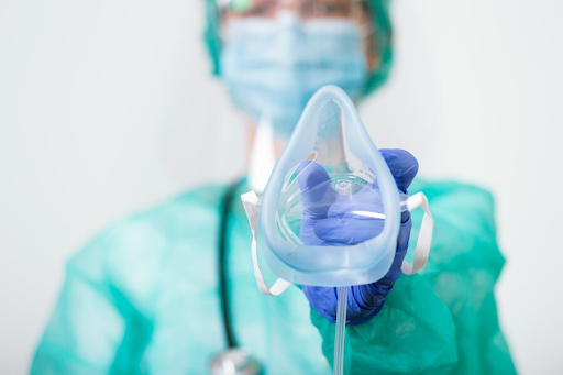 Healthcare worker with an Oxygen Mask 