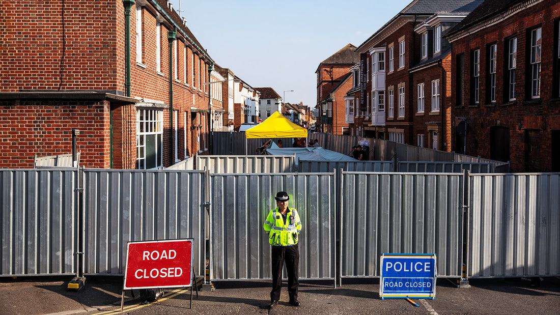 road closed, guarded by a British cop