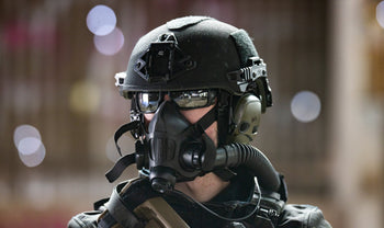 an operator wearing an air purifying respirator