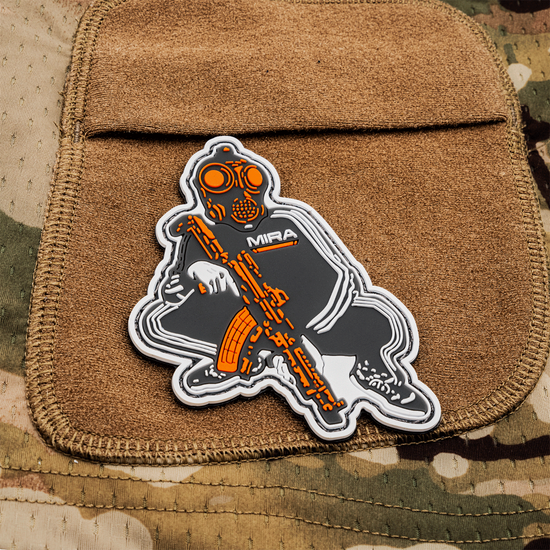 Close up Back view of a tactical plate carrier with Slav Squat morale patch.