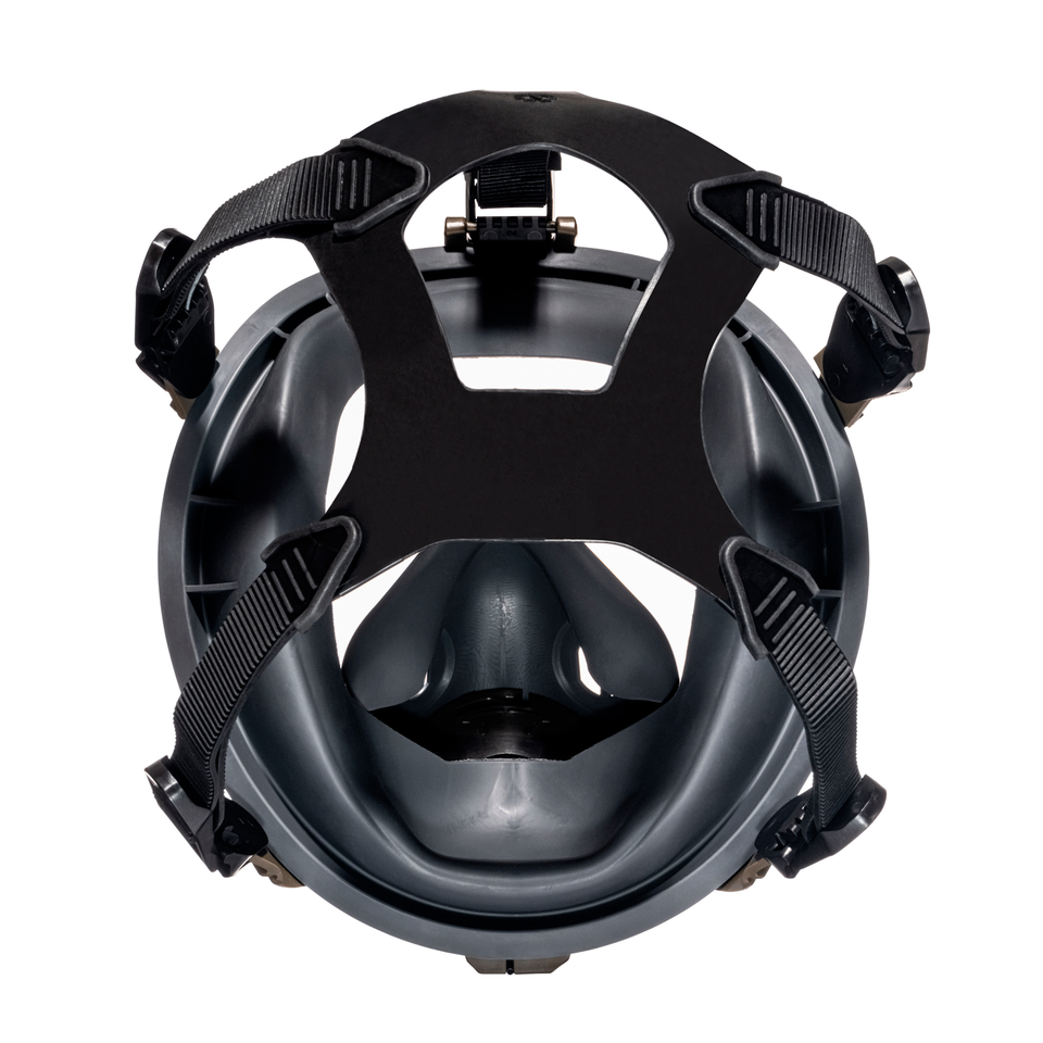 Medium shot of the back side of the CM-I01 respirator in green, with its 5 point head harness in view.