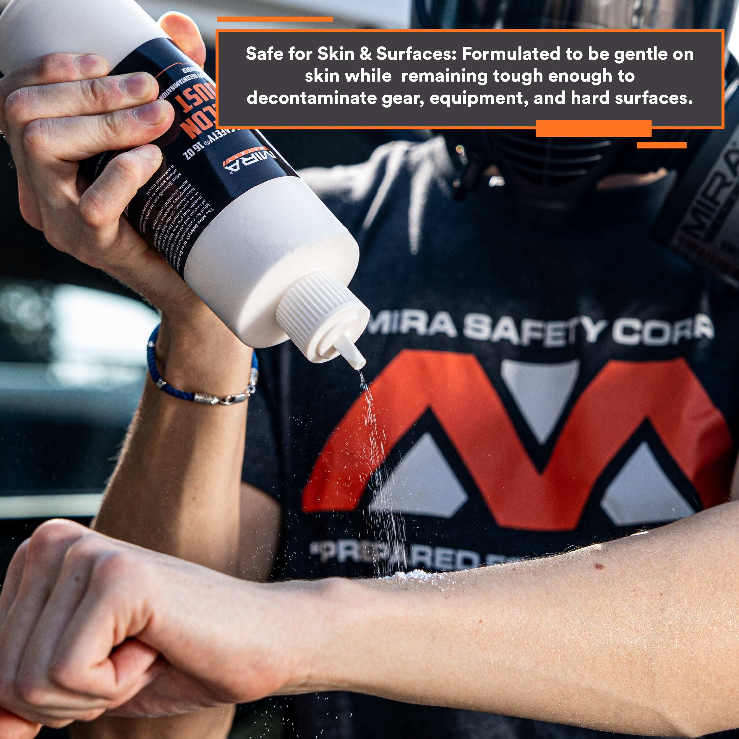 person applying DeconDust™ to their wrist to show safety