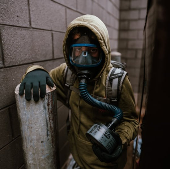 Child In Blue Frame Gas Mask Outdoors