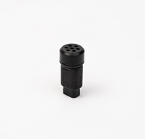 Black cylindrical object with multiple holes on a white background