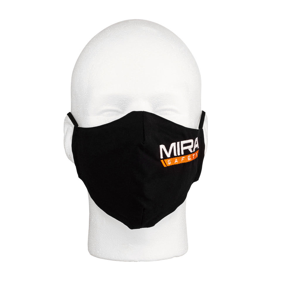 Front view of the MIRA Safety Mask with the classic logo on a mannequin head