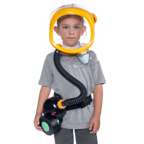 Child wearing the MD-2 Kid's Gas Mask with a PAPR system strapped to his hip