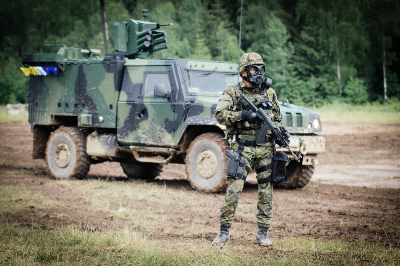 Military man with the NBC-77 SOF CBRN gas mask filter