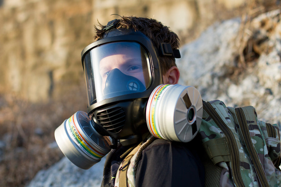 Child wearing the CM-6M tactical gas mask