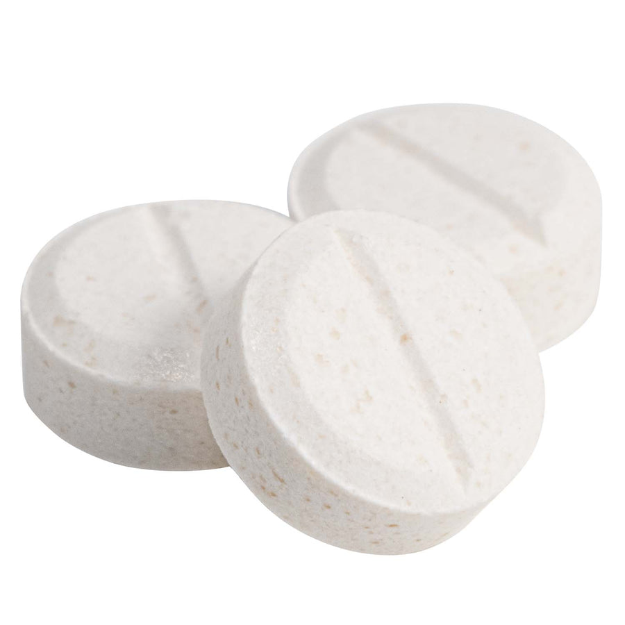 Close up shot of 3 potassium iodide tablets